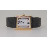 A LADIES MUST DE CARTIER TANK WATCH this model has a three coloured gold detailed dial with 12 & 6