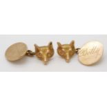 A PAIR OF 9CT GOLD FOX CUFFLINKS the highly detailed fox heads are linked by a chain to 9ct ovals