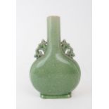A CHINESE CRACKLEWARE BALUSTER VASE  Applied with pierced scroll handles, 21.5cm high Condition