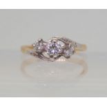 A VINTAGE THREE STONE DIAMOND RING set with estimated approx 0.50cts of brilliant cut diamonds to