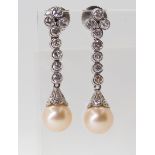 DIAMOND & PEARL DROP EARRINGS each cream pearl measures approx 8mm, set into a diamond set