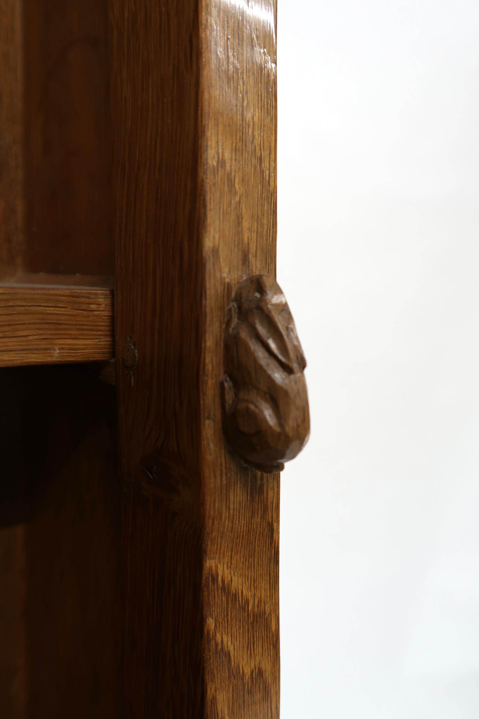 A PETER "RABBITMAN" HEAP OAK KITCHEN DRESSER with cornice carved with key design over two open plate - Image 8 of 13