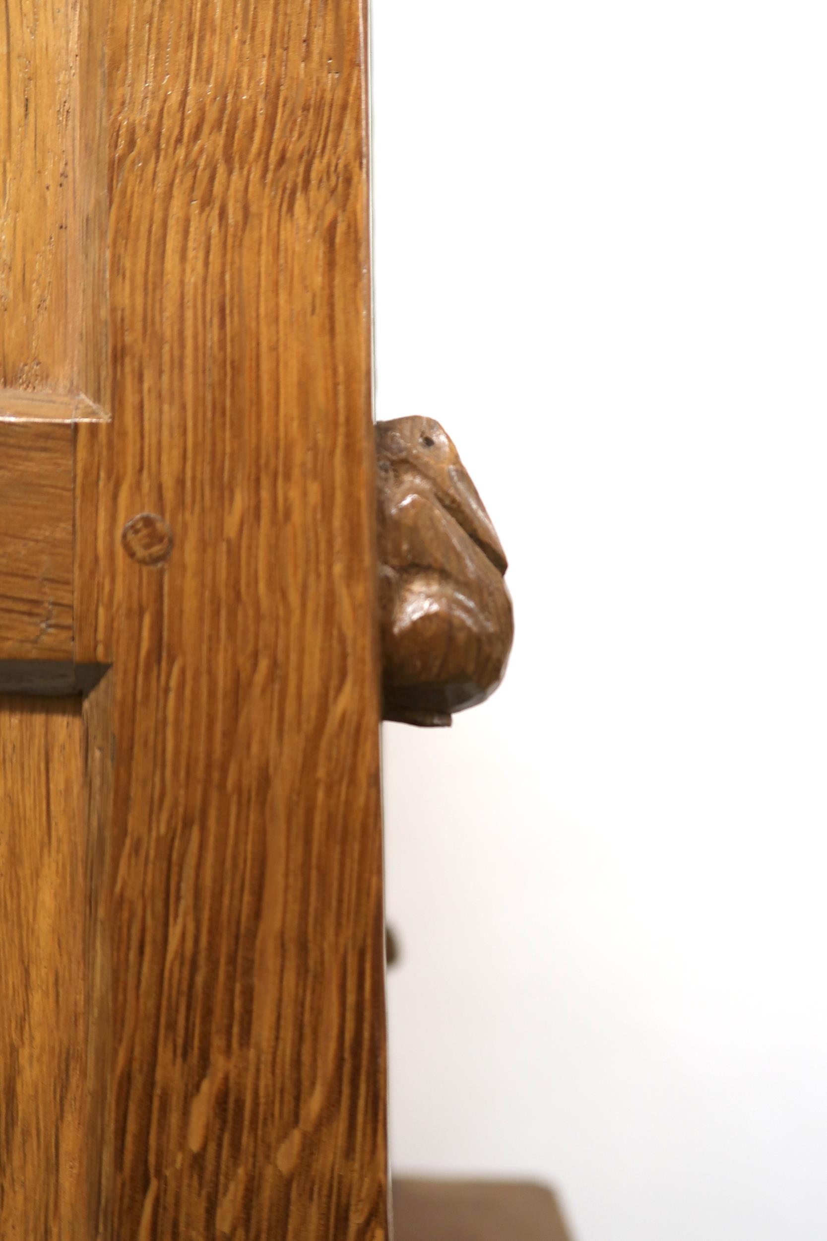 A PETER "RABBITMAN" HEAP OAK KITCHEN DRESSER with cornice carved with key design over two open plate - Image 13 of 13