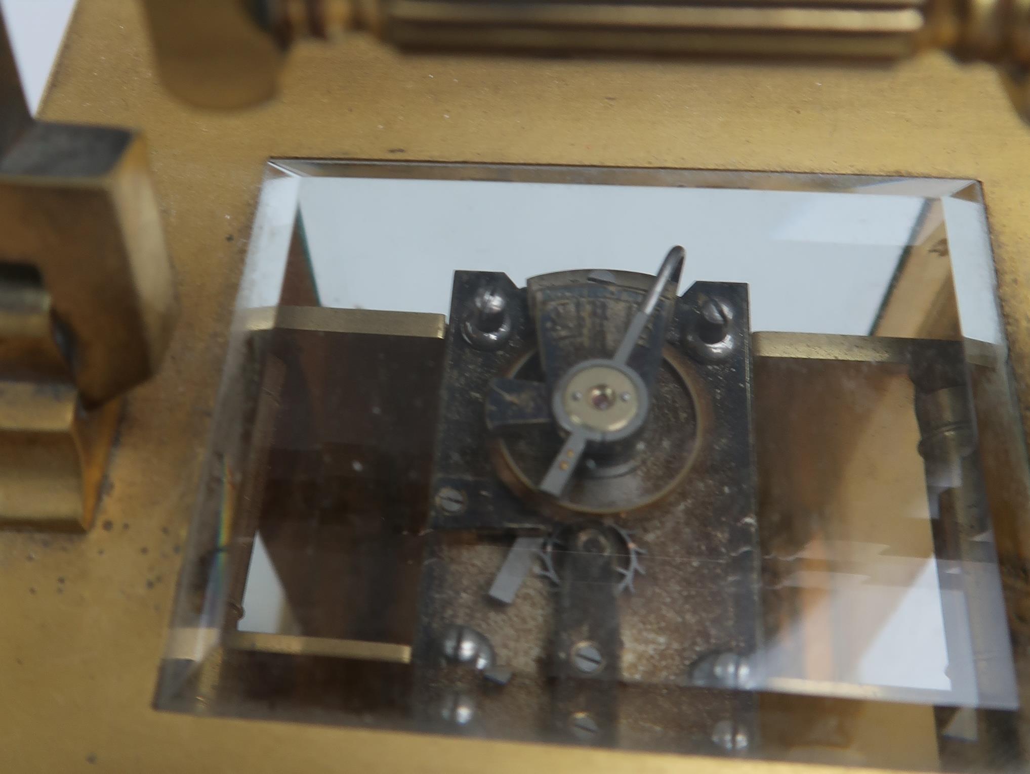 A 19TH CENTURY FRENCH BRASS AND GLASS CARRIAGE CLOCK with silvered dial, and roman numerals, - Image 4 of 4