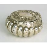 A CONTINENTAL SILVER SNUFF BOX probably German, with import marks for Edwin Thompson Bryant, London,