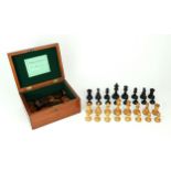 THE STAUNTON CHESSMEN BY JACQUE & SON, LONDON In boxwood and ebony, both kings stamped "Jacques