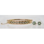 AN EMERALD & PEARL BANGLE AND EARRINGS the 9ct bangle is set with alternate emeralds and pearls with