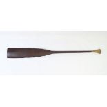 A PALMWOOD PADDLE, NEW IRELAND The flared pommel with woven fibre covering, measuring approx. 99.5cm