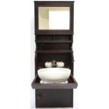 A LATE VICTORIAN MAHOGANY SHIPS CABIN WASHSTAND  with rectangular mirror over open shelves over fall