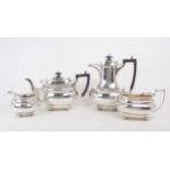 A GEORGE V FOUR PIECE SILVER TEA SERVICE by James Deakin & Sons, Sheffield 1918, of swollen baluster