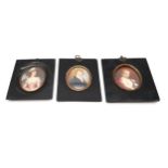 THREE EARLY-19TH CENTURY PORTRAIT MINIATURES Painted on ivory, depicting respectively a red-haired
