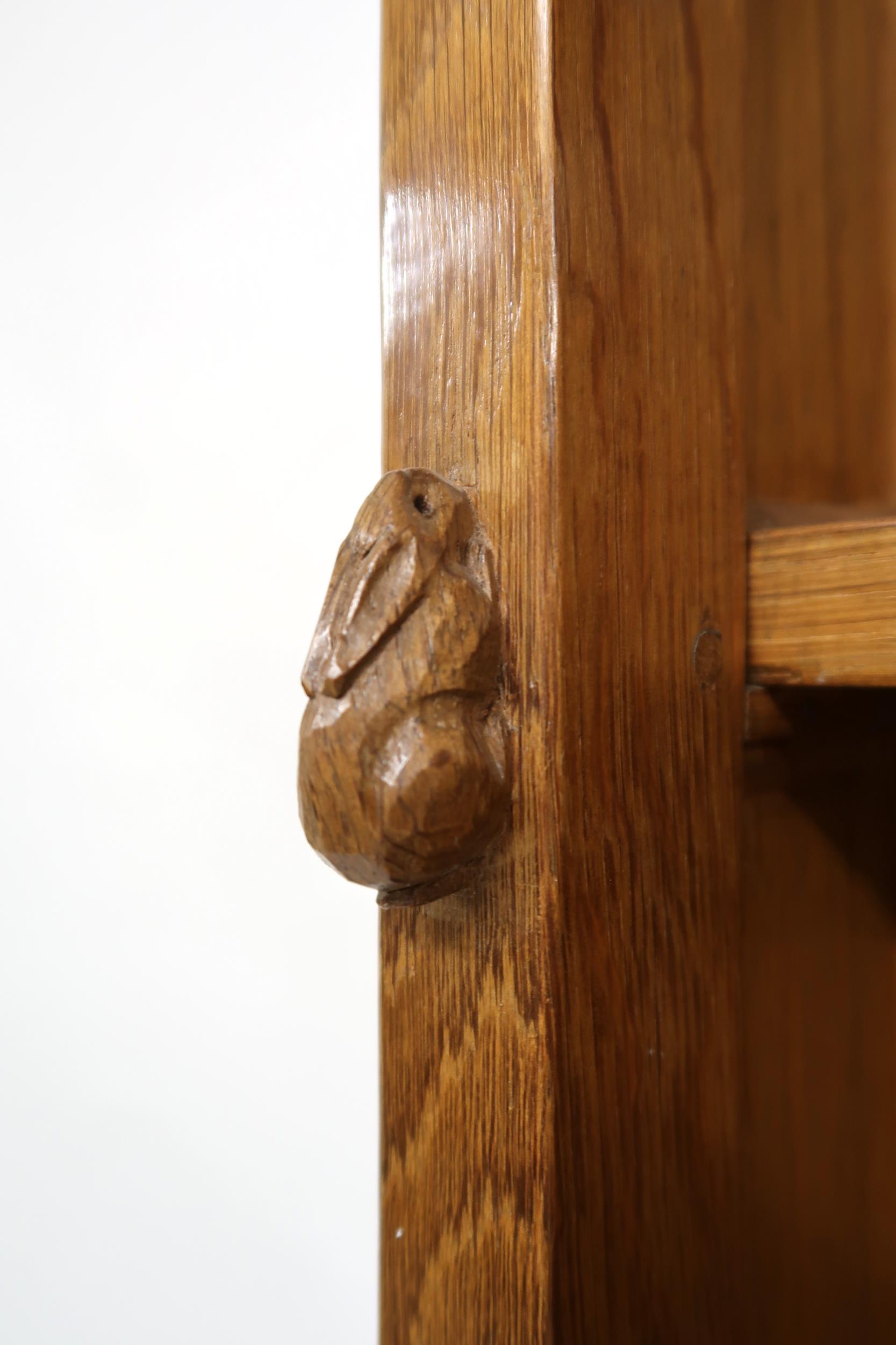 A PETER "RABBITMAN" HEAP OAK KITCHEN DRESSER with cornice carved with key design over two open plate - Image 7 of 13