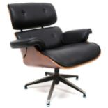 A 20TH CENTURY AFTER CHARLES & RAY EAMES LOUNGE CHAIR  with buttoned black vinyl upholstered