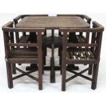 A CIRCA 1935 TEAK HEALS OF LONDON GARDEN TABLE AND CHAIRS  the teak for the suite having been
