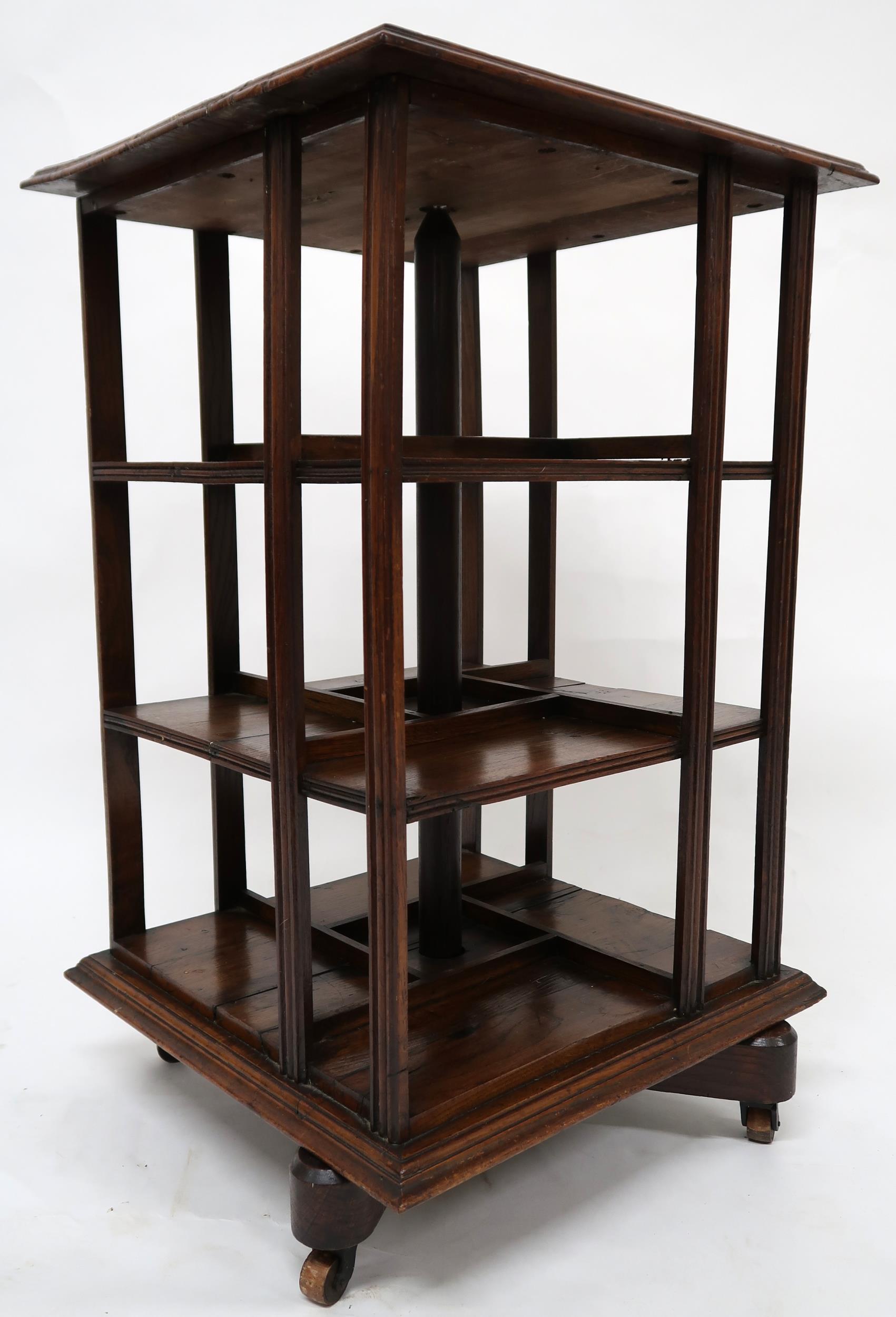 AN EARLY 20TH CENTURY OAK AND PINE GOODALL, LAMB & HEIGHWAY LTD MANCHESTER REVOLVING BOOKCASE - Image 8 of 9