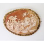 A LARGE CLASSICAL THEMED CAMEO the well carved shell cameo depicting Apollo in his horse drawn