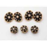 A VINTAGE SET OF CUFFLINKS AND STUDS mounted in yellow metal, set with black glass and pearls, in