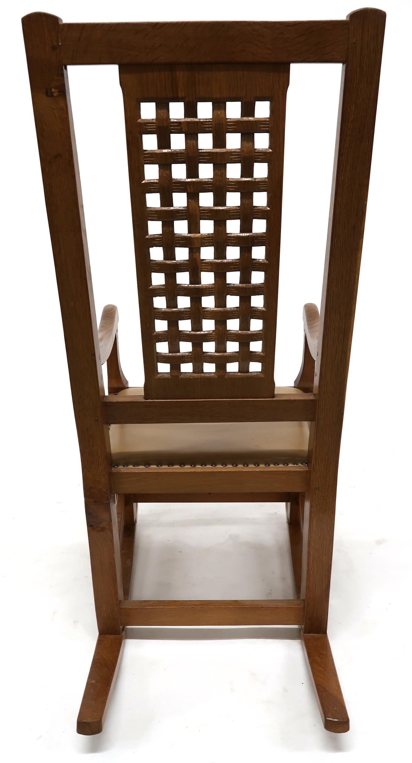 A PETER "RABBITMAN" HEAP OAK LATTICE BACK ROCKING CHAIR with carved lattice splat over beige leather - Image 6 of 11