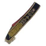 A 20th CENTURY KING'S OWN SCOTTISH BORDERERS DRUM MAJOR'S BALDRIC SASH Of black wool Melton cloth