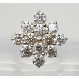 A SUBSTANTIAL DIAMOND CLUSTER RING set with estimated approx 3.60cts of brilliant cut diamonds,