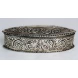 A VICTORIAN SILVER JEWELLERY BOX by Robert Humphries, London 1881, of oval form, with moulded