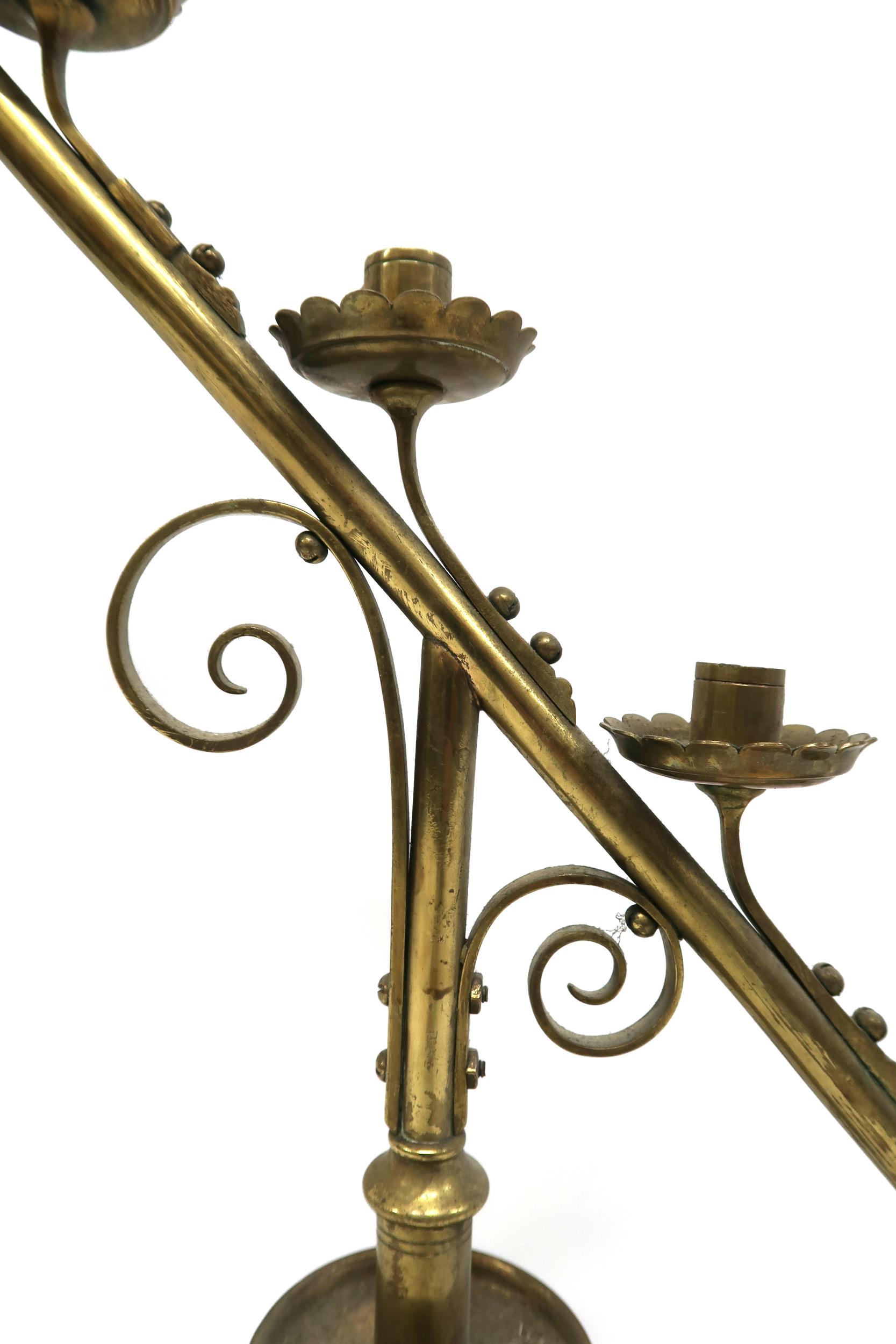 A PAIR OF 19TH CENTURY BRASS ECCLESIASTICAL SLOPED CANDELABRA each with seven candle holders with - Image 4 of 6