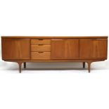 A MID 20TH CENTURY TEAK GREAVES & THOMAS SIDEBOARD  with three drawers and fall front compartment