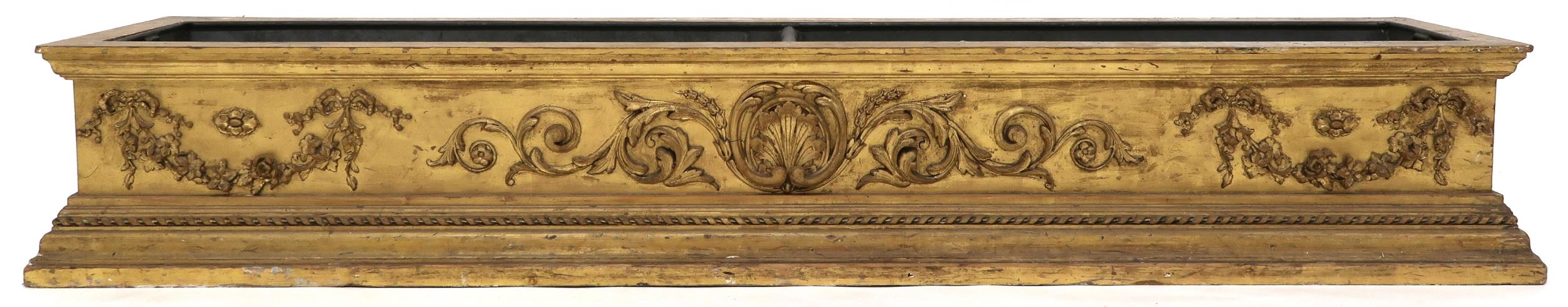 A LARGE 19TH CENTURY PINE GILT GESSO PLANT TROUGH  with moulded cornice over central scrolled