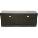 A MID-20TH CENTURY FRENCH PIERRE VANDEL SIDEBOARD black lacquer and glass with gilt trim and handles