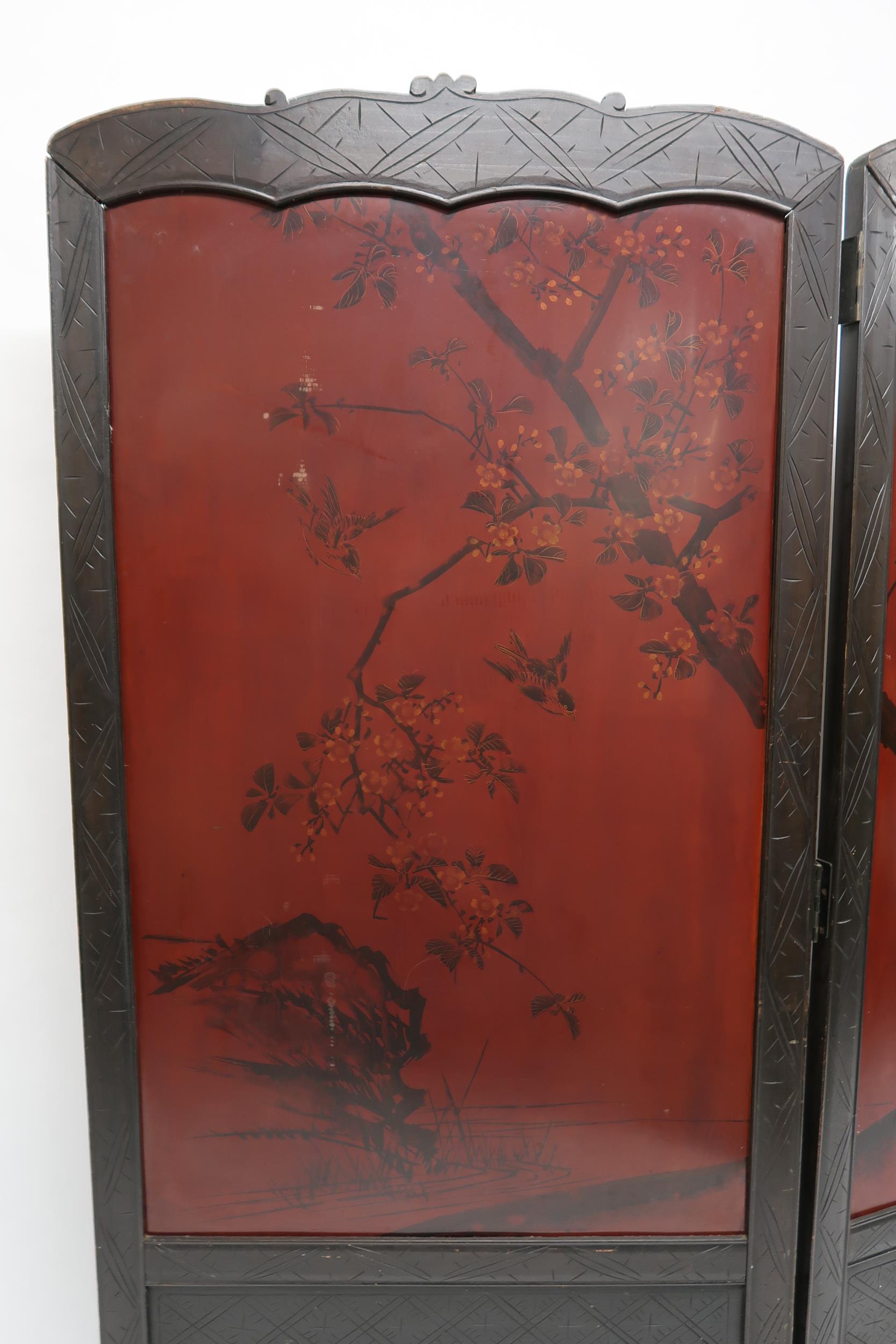 AN ORIENTAL HARDWOOD FRAMED LACQUERED TWO FOLD ROOM DIVIDER with foliate carved frame surrounding - Image 14 of 17