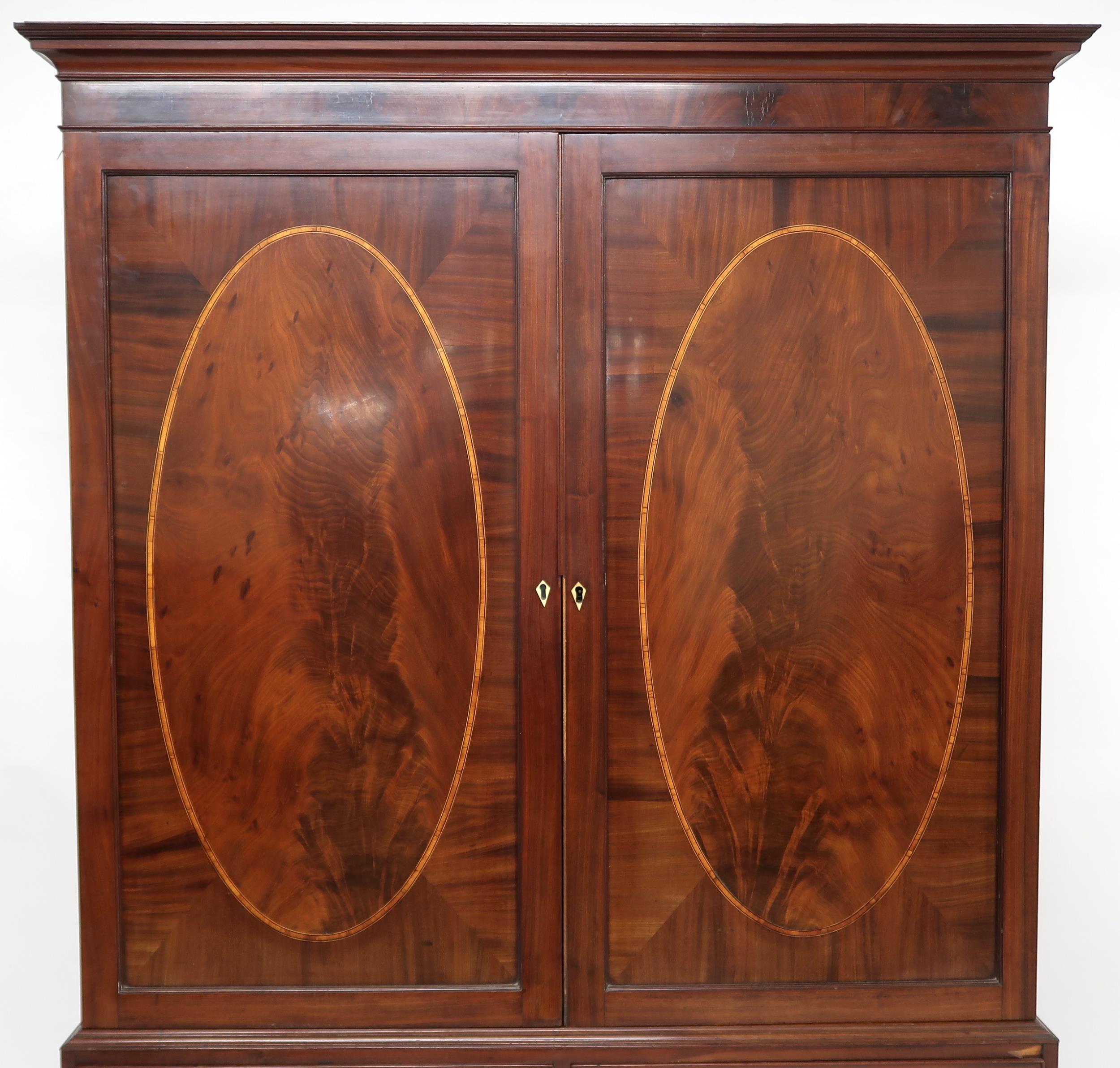 A GEORGIAN MAHOGANY LINEN PRESS  with moulded cornice over pair of satinwood inlaid panel doors - Image 6 of 10