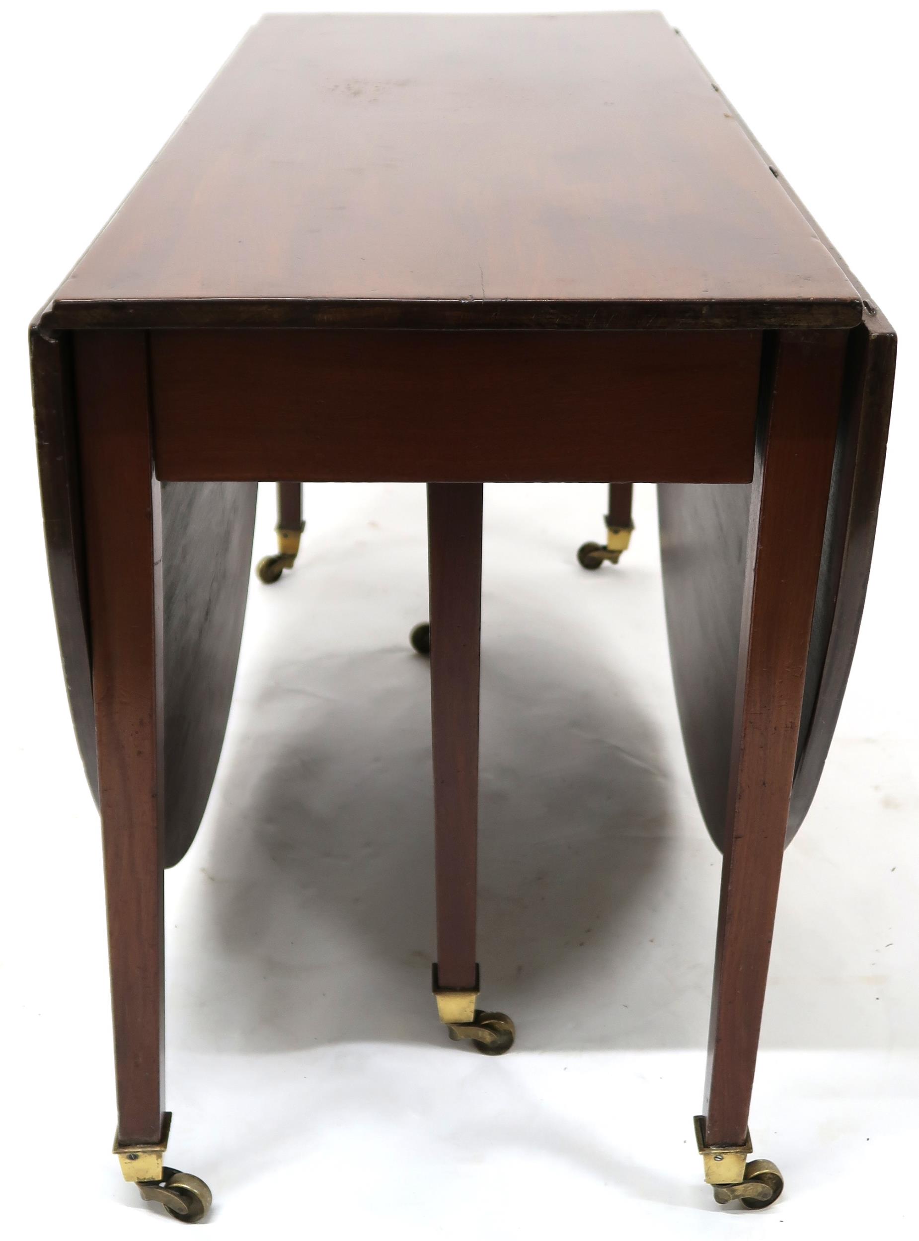 A VICTORIAN MAHOGANY DROPLEAF TABLE  with oval drop leaf top on square tapering supports terminating - Image 9 of 10