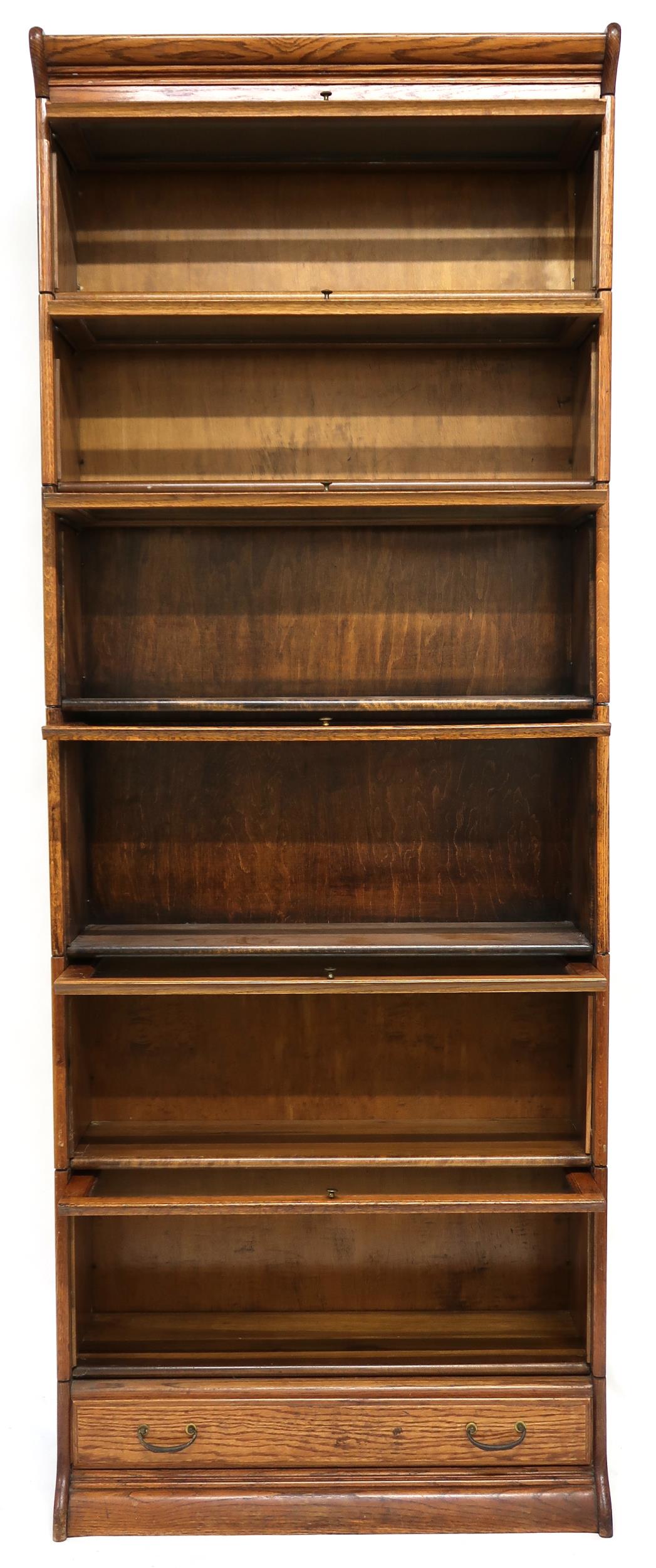 AN EARLY 20TH CENTURY OAK GLOBE-WERNICKE STYLE SIX TIER SECTIONAL BOOKCASE with six glazed doored - Image 7 of 13