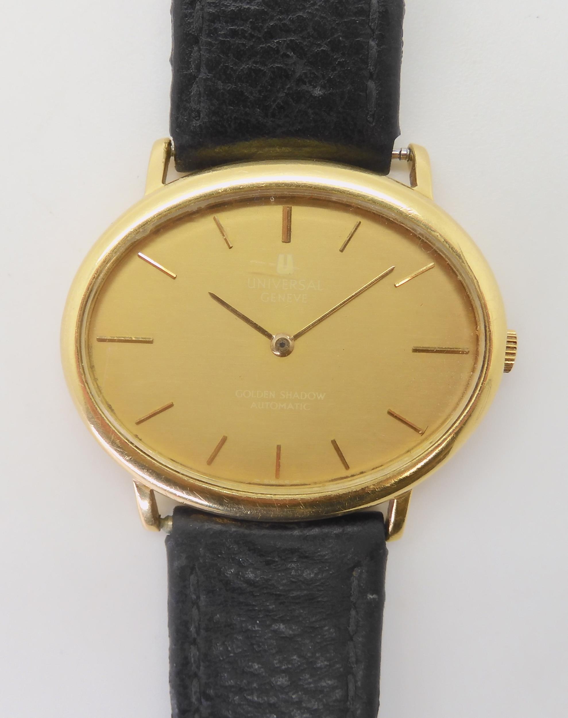A UNIVERSAL GENEVE GOLDEN SHADOW  with an automatic movement, the case in 18ct gold with Swiss