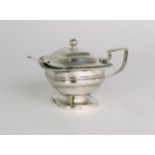 A GEORGE III SILVER MUSTARD POT by Solomon Hougham, Solomon Royes & John East Dix, London 1818, of