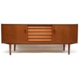 A MID 20TH CENTURY SWEDISH TEAK NILS JONSSON FOR TROEDS "TRIO" SIDEBOARD with central bank of five