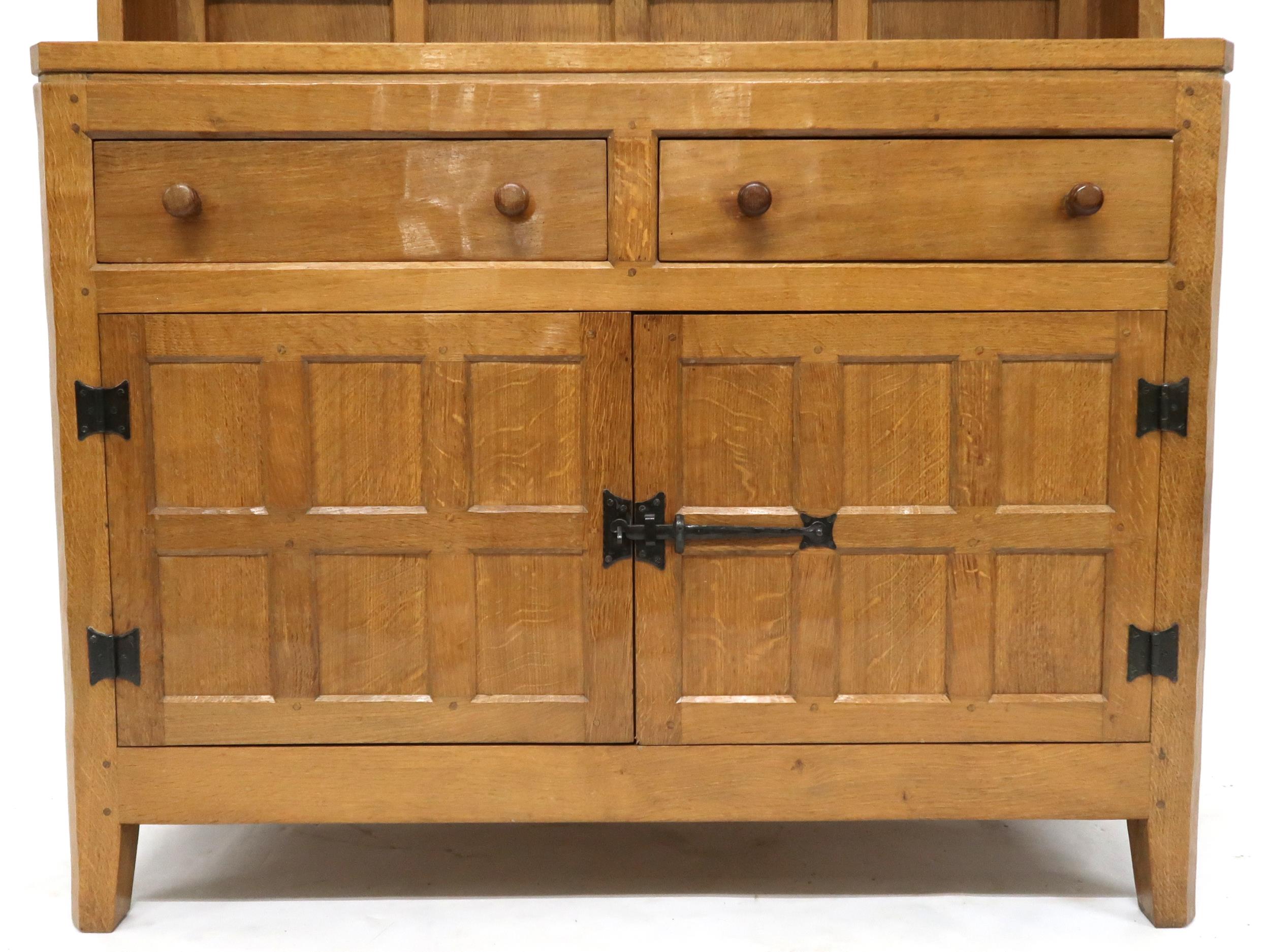 A PETER "RABBITMAN" HEAP OAK KITCHEN DRESSER with cornice carved with key design over two open plate - Image 2 of 13