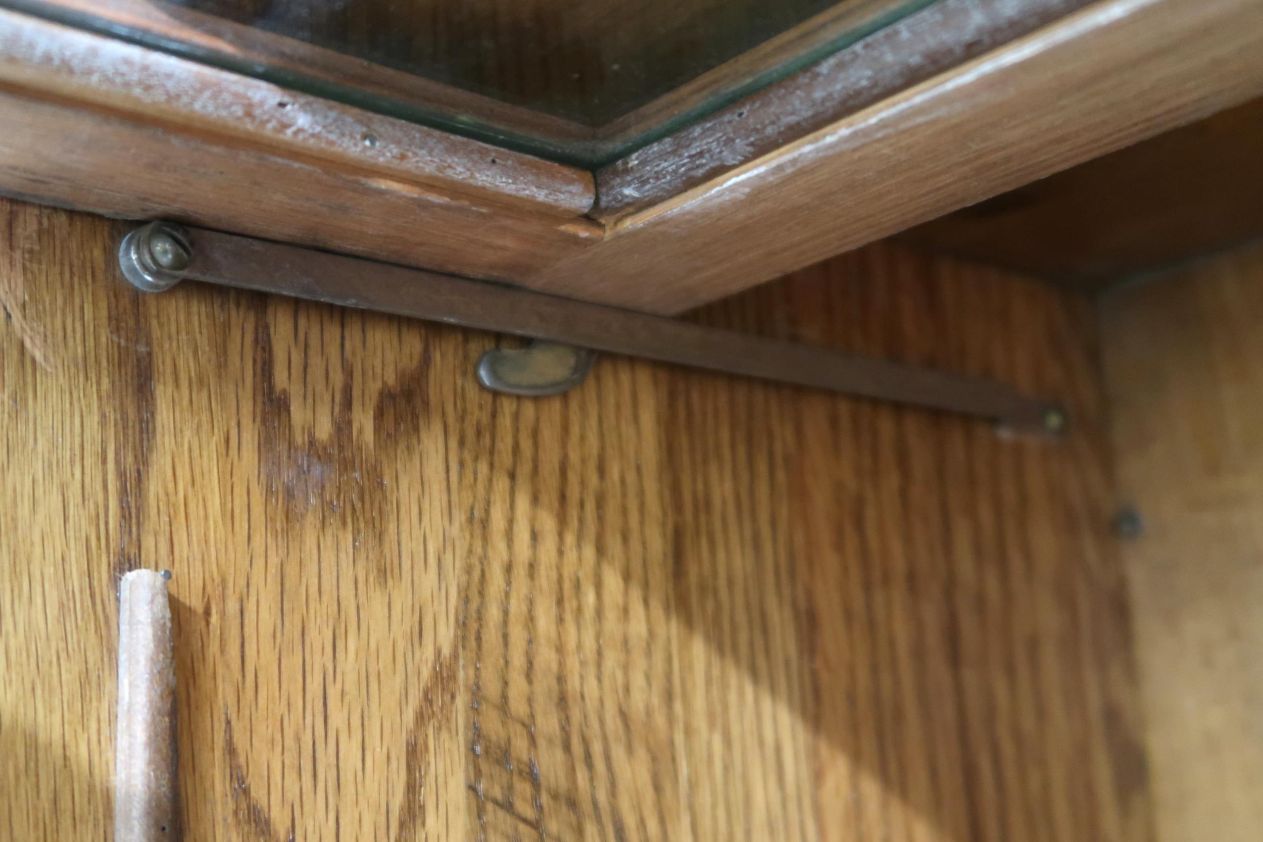 AN EARLY 20TH CENTURY OAK GLOBE-WERNICKE STYLE SIX TIER SECTIONAL BOOKCASE with six glazed doored - Image 10 of 13