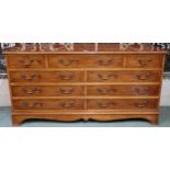 A 20th century reproduction bank of drawers with three drawers over three pairs of drawers on