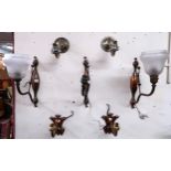 A lot to include three Arts & Crafts copper wall lights, another pair of Arts & Crafts style wall