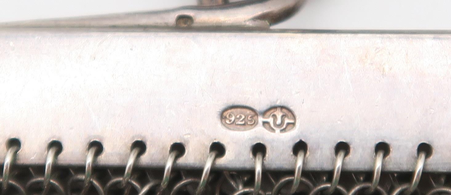 A silver chain mesh purse, with import marks for Paul Ettinger, London, and an EPNS napkin ring ( - Image 2 of 2