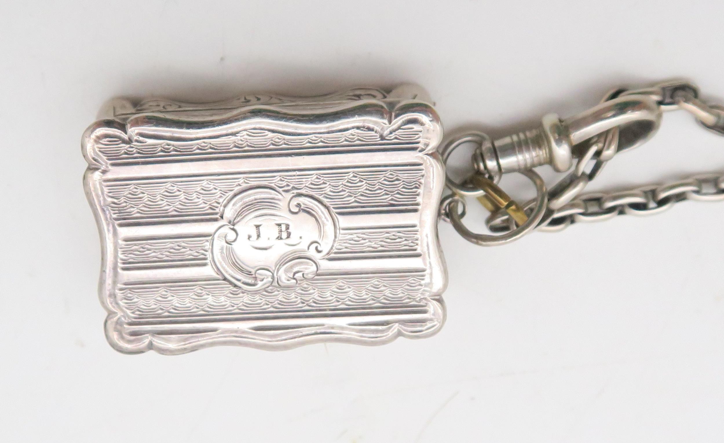 A Victorian silver vinaigrette, by Edward Smith, Birmingham 1852, of shaped form, with engine turned - Image 2 of 3