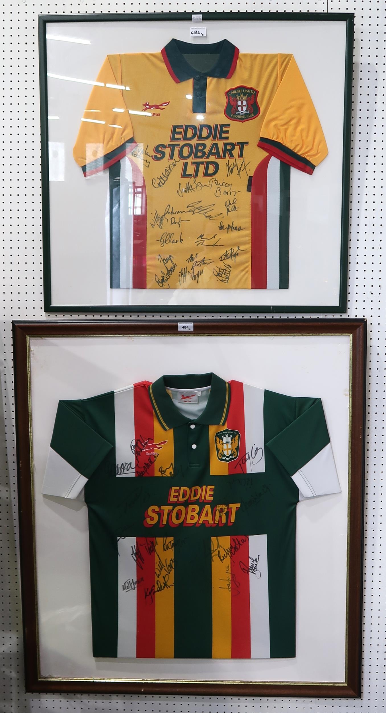 Two framed Carlisle United "Eddie Stobart" football shirts, both bearing team signatures (the larger