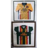 Two framed Carlisle United "Eddie Stobart" football shirts, both bearing team signatures (the larger