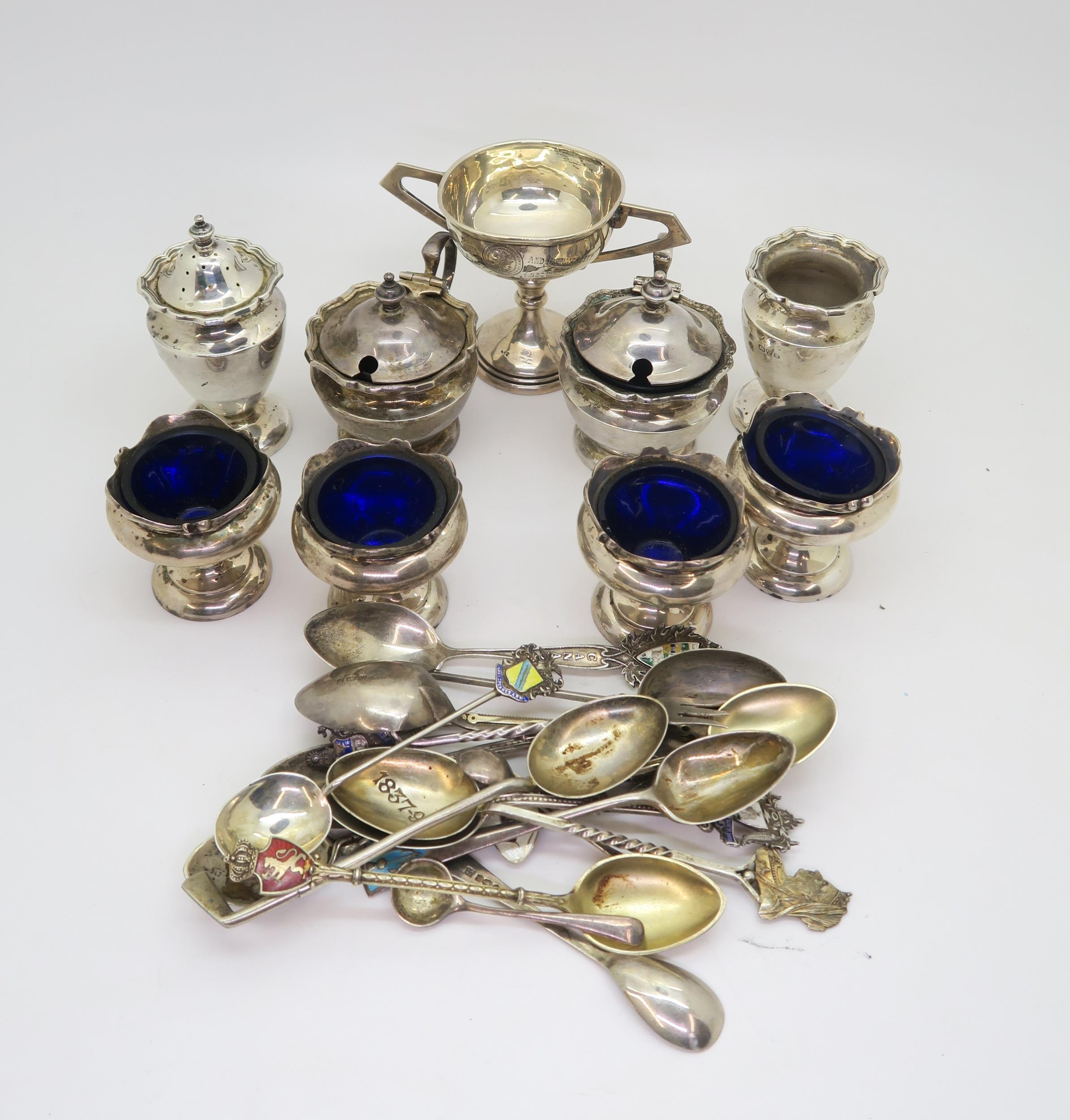 A collection of silver including a four piece cruet set, by Deakin & Sons, Chester, four open silver