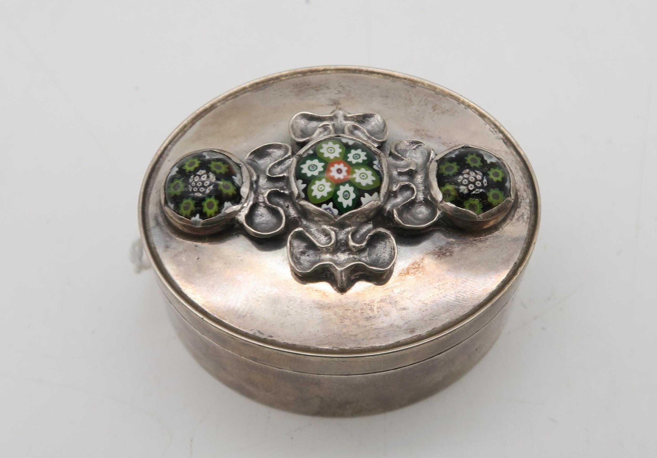 David Francis Hodges; a silver trinket box, of oval form, the lid with cast naturalistic