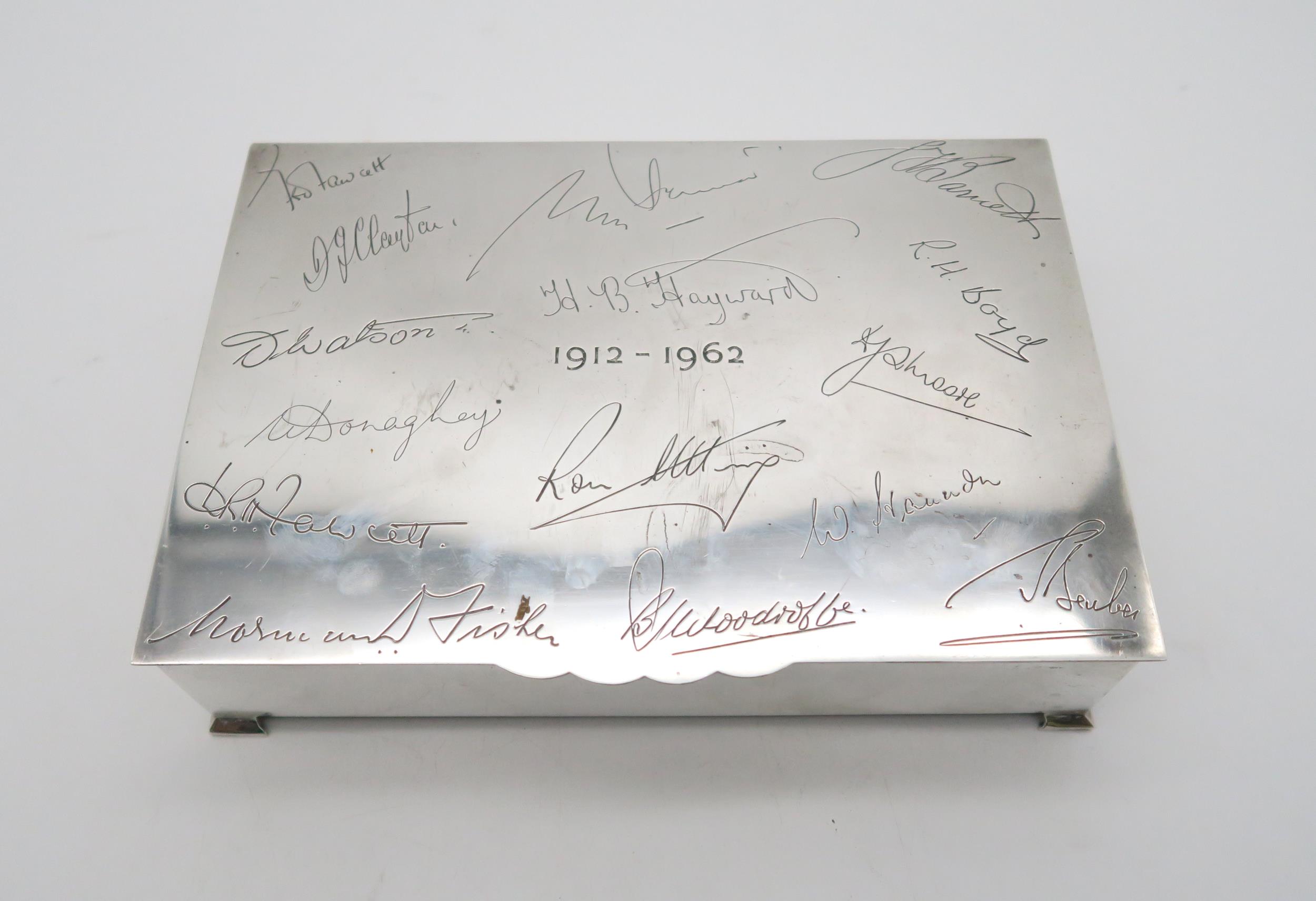 A silver cigar box, by S J Rose & Son, London 1961, with engraved signatures to the lid, and a