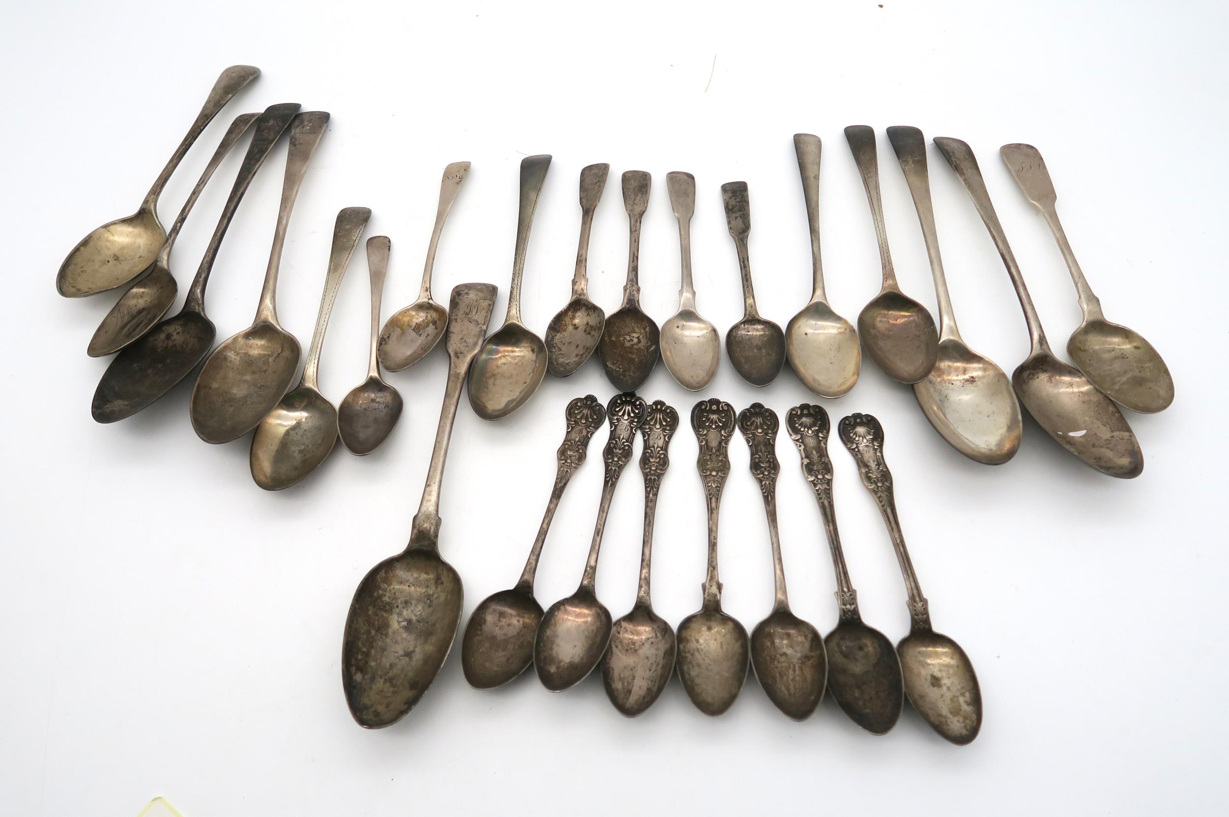 A collection of Georgian and later silver flatware, including two Old English pattern table spoons