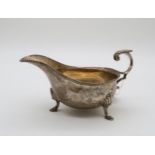 A silver sauce boat, by Harrison Brothers & Howson, London 1931, in the George III style, with a