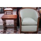A lot comprising 20th century green upholstered tub chair and a mahogany rectangular topped nest